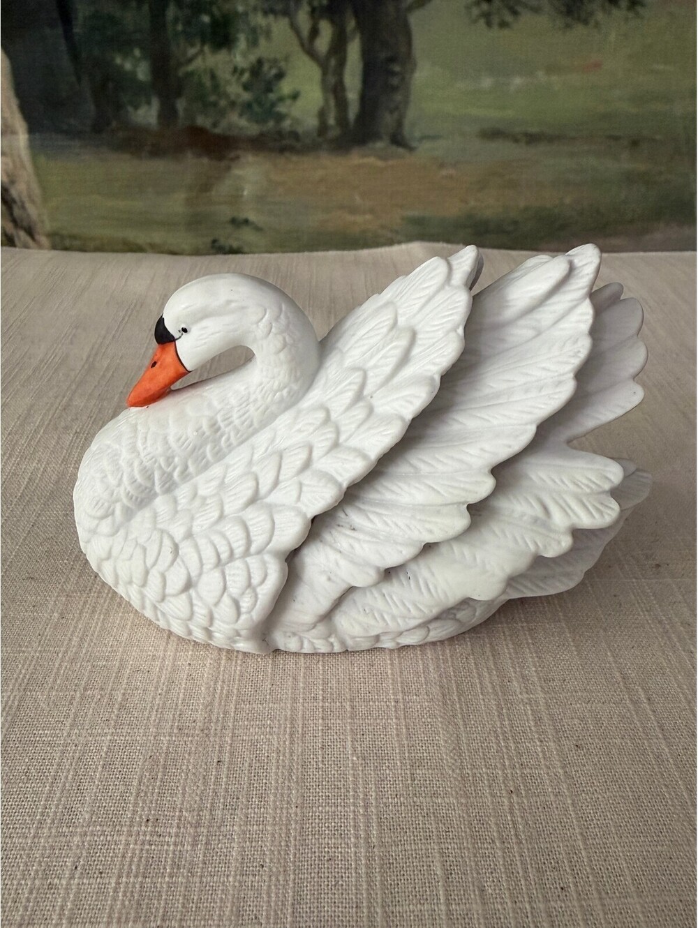 Small white porcelain swan figurine